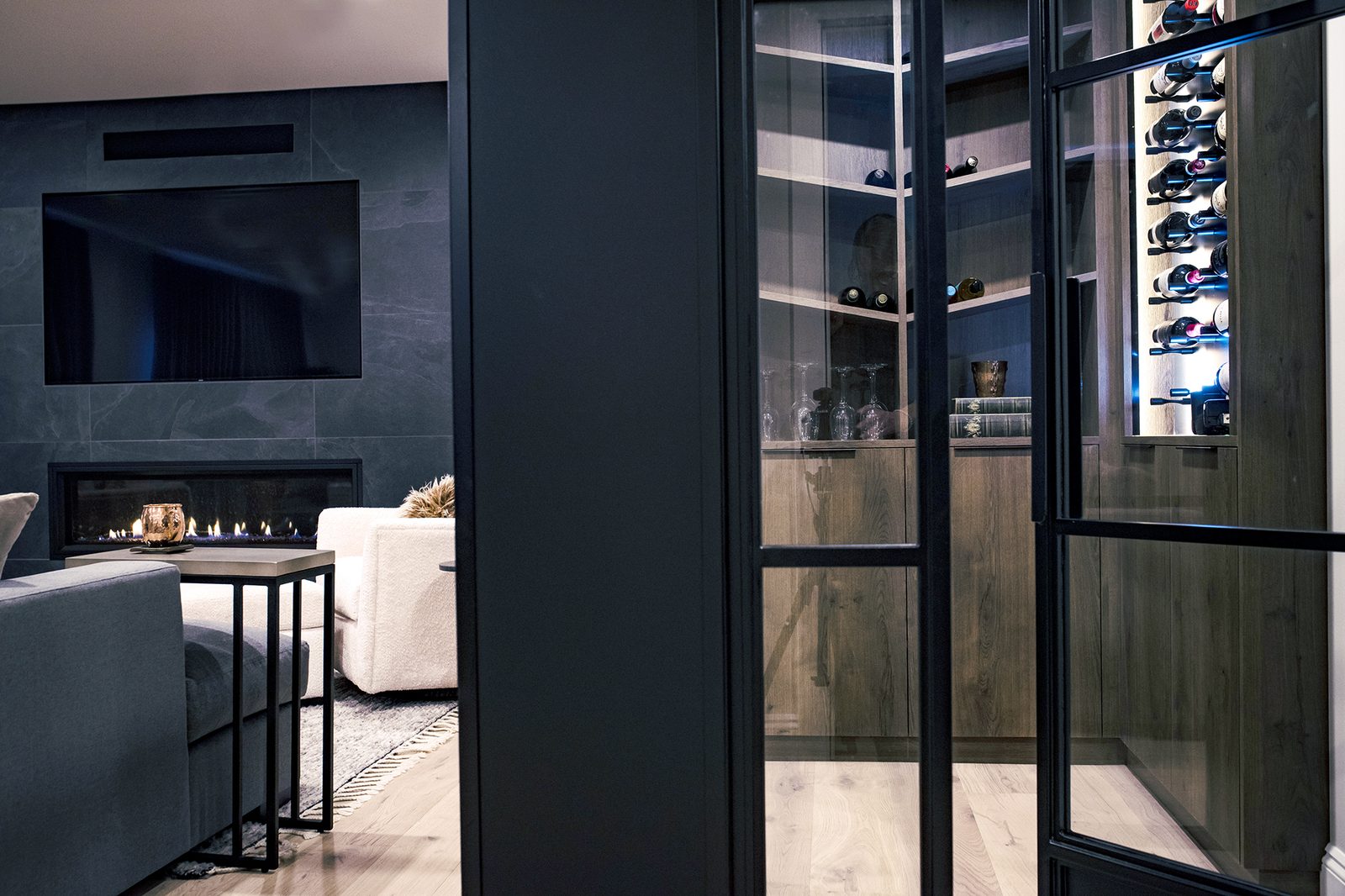 Chestermere wine room beside the fireplace