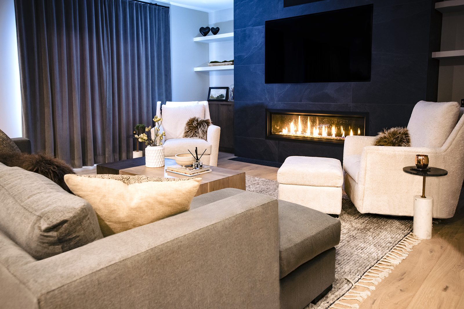 Chestermere seating area by the fireplace